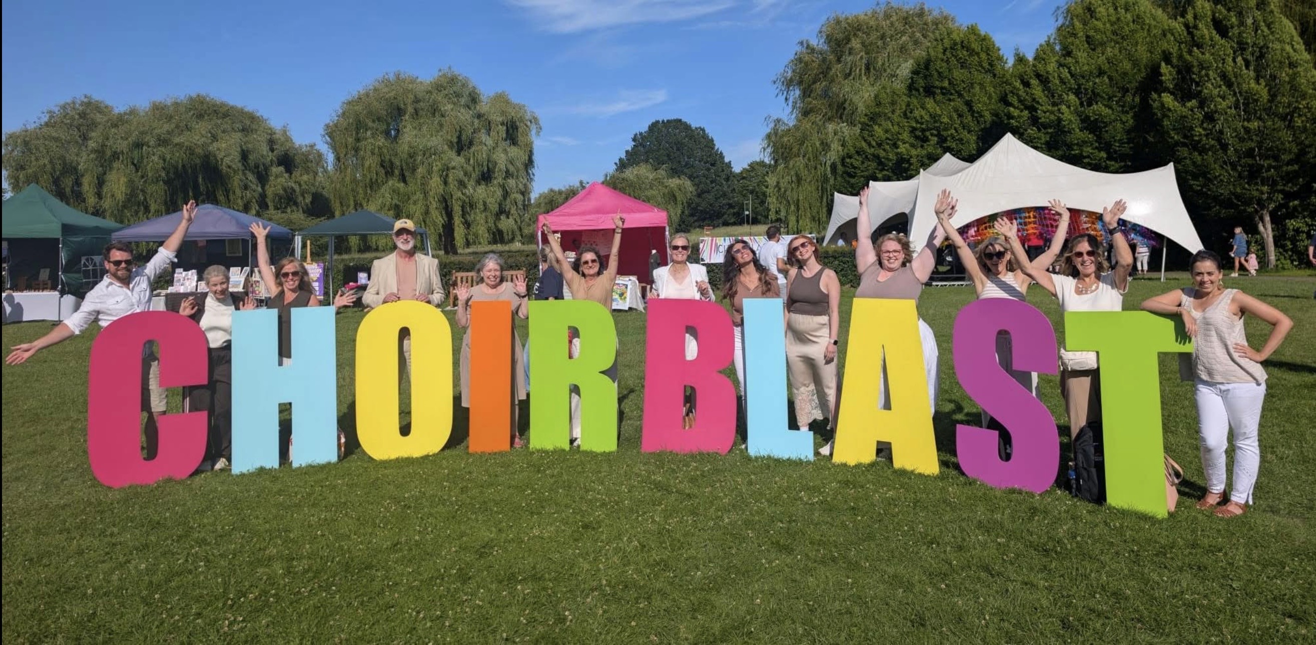 Cadence with the colourful ChoirBLAST sign