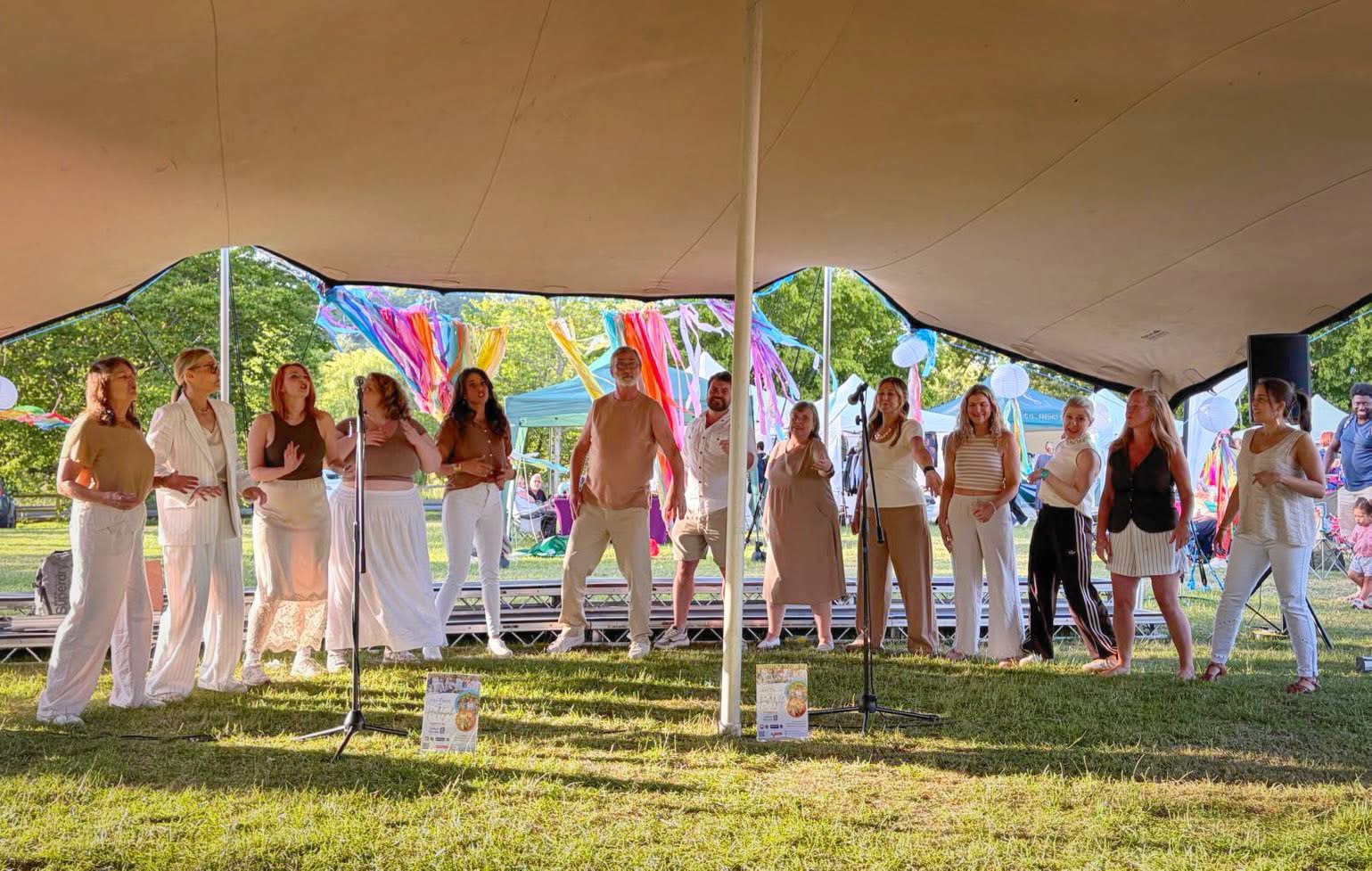 Cadence performing beneath the festival canopy at ChoirBLAST